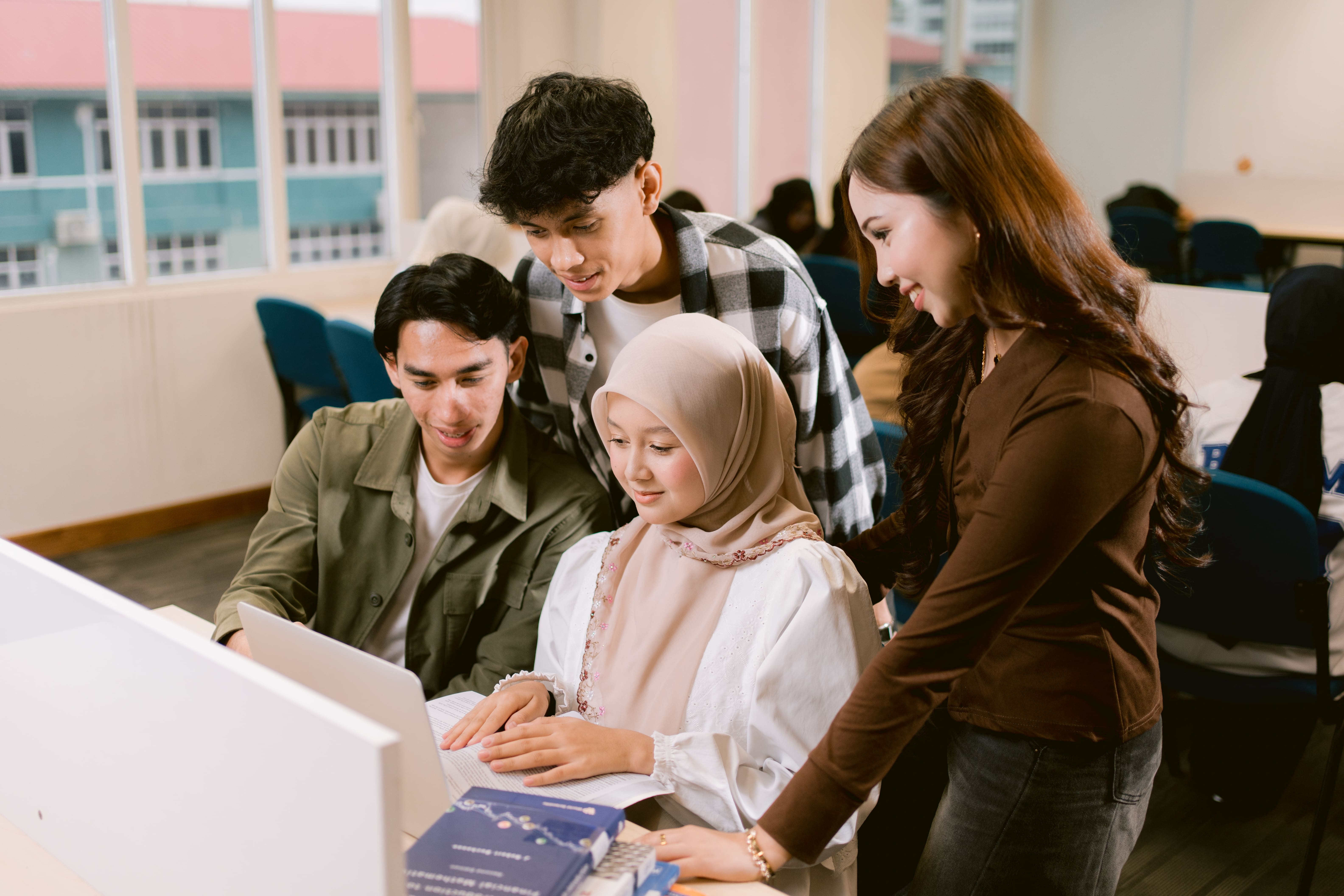 Students studying together on campus